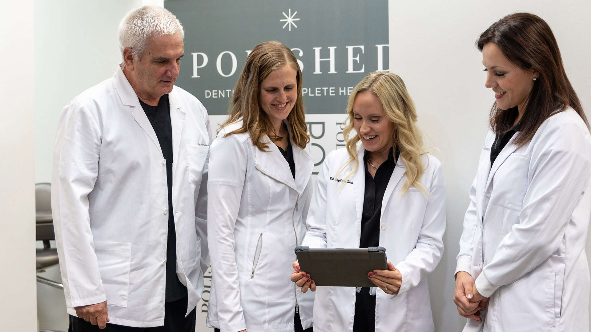 Dentists Reviewing Patient Charts